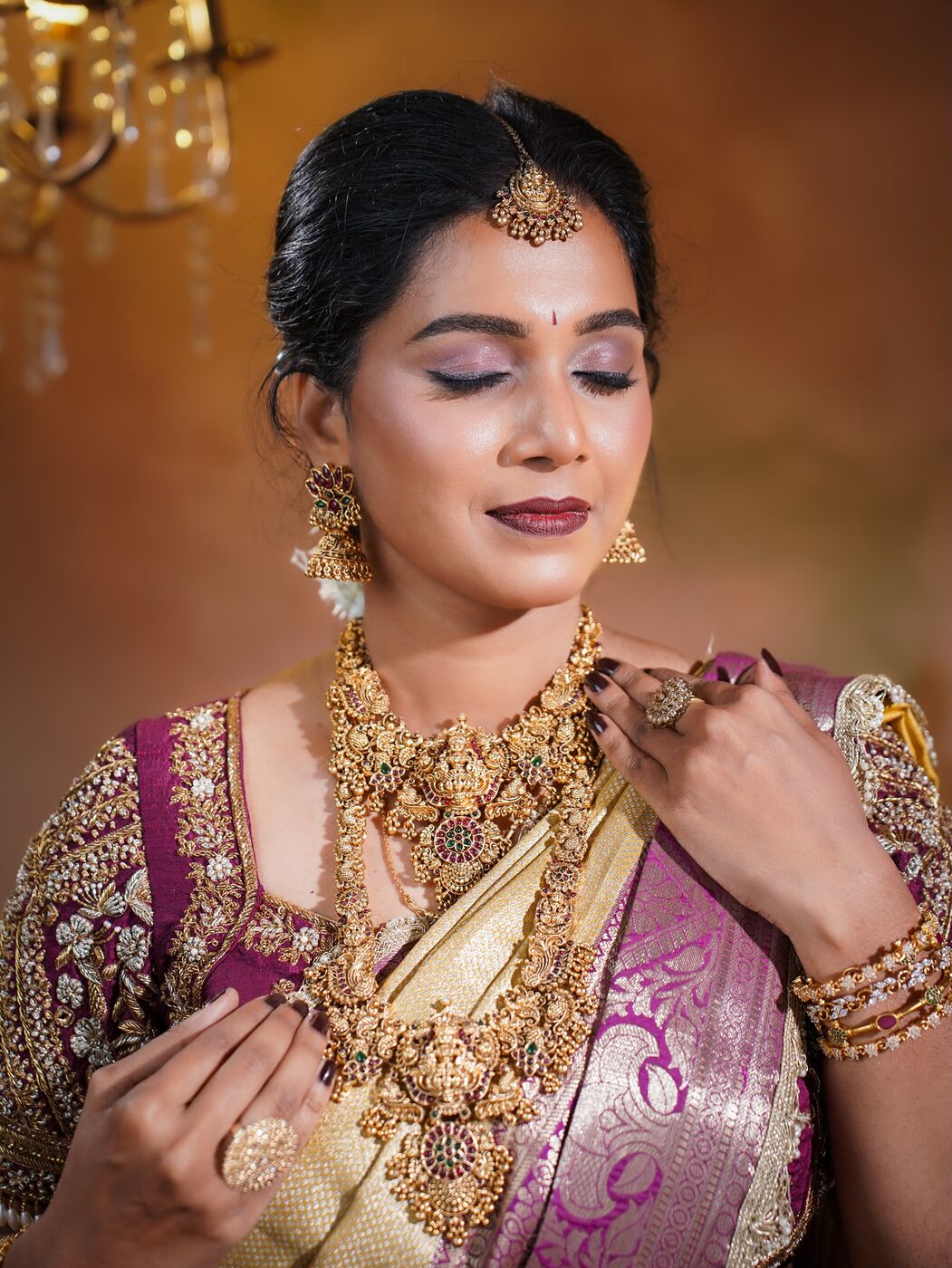 Soft glam bridal look with shimmer lids and temple jewellery